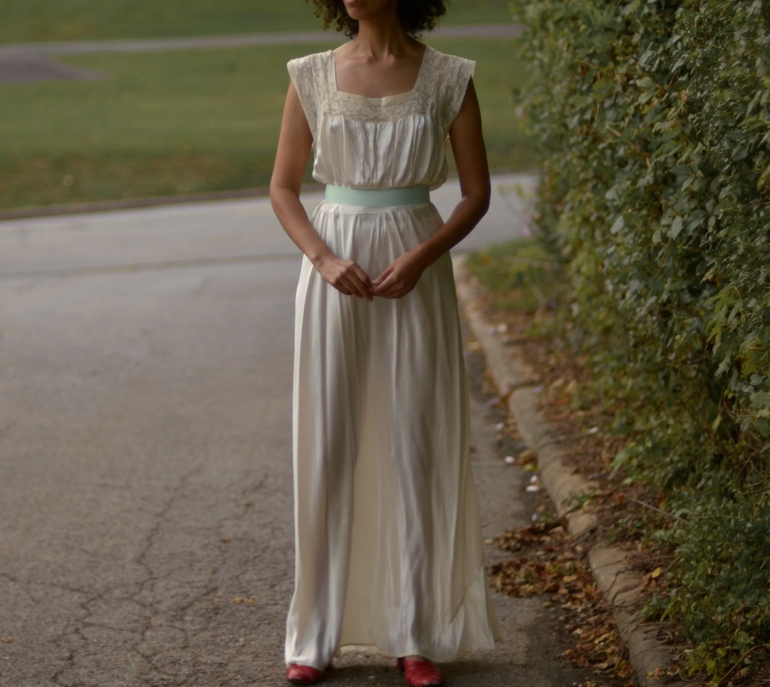 1930s cream satin full length bias cut slip dress with alencon lace trim and deep v back // fits up to large