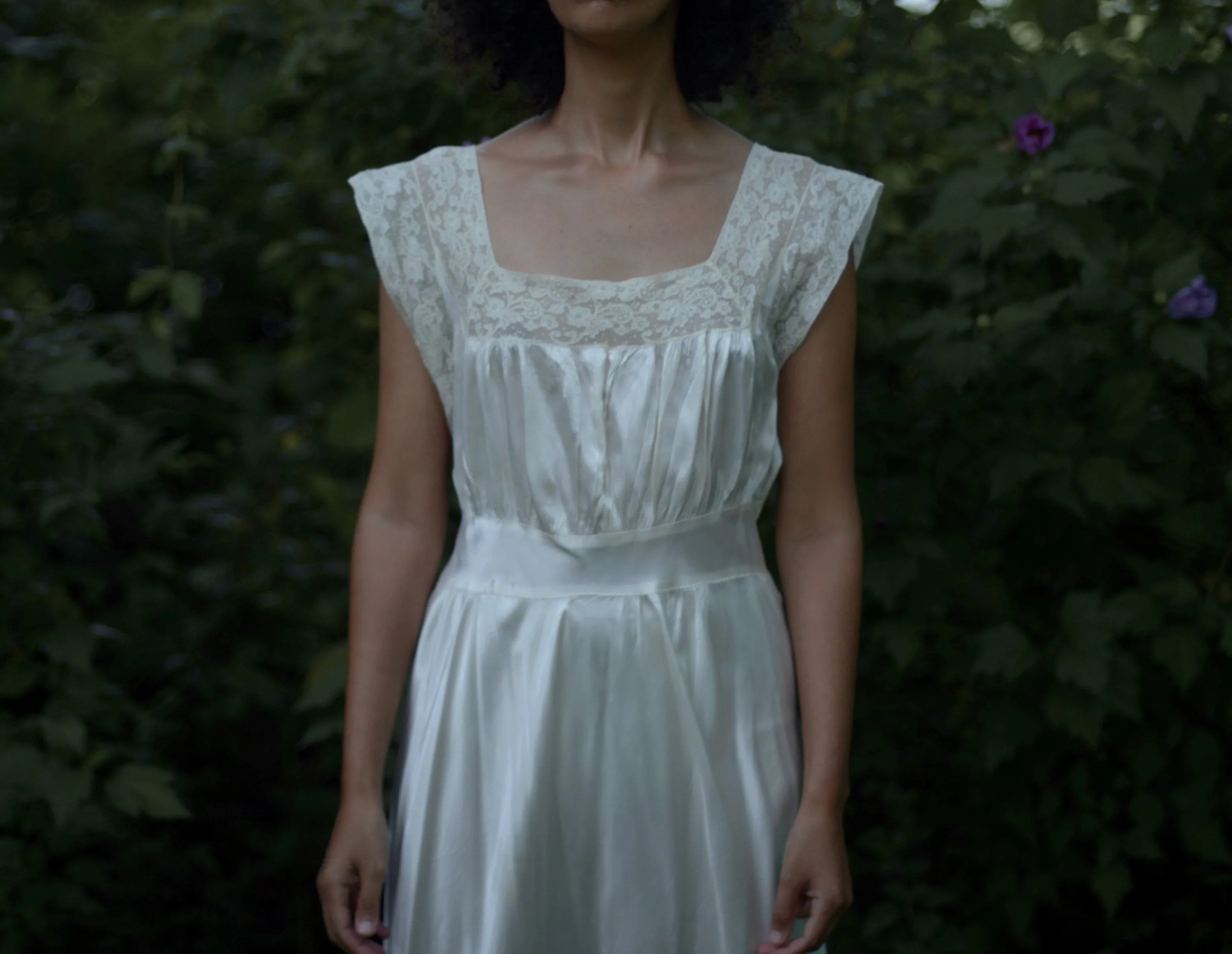 1930s cream satin full length bias cut slip dress with alencon lace trim and deep v back // fits up to large