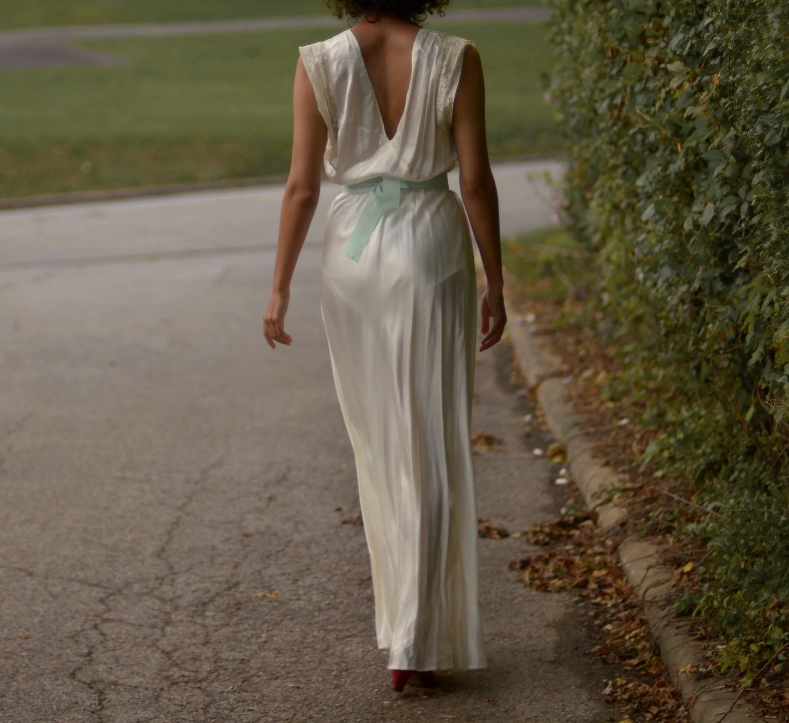 1930s cream satin full length bias cut slip dress with alencon lace trim and deep v back // fits up to large