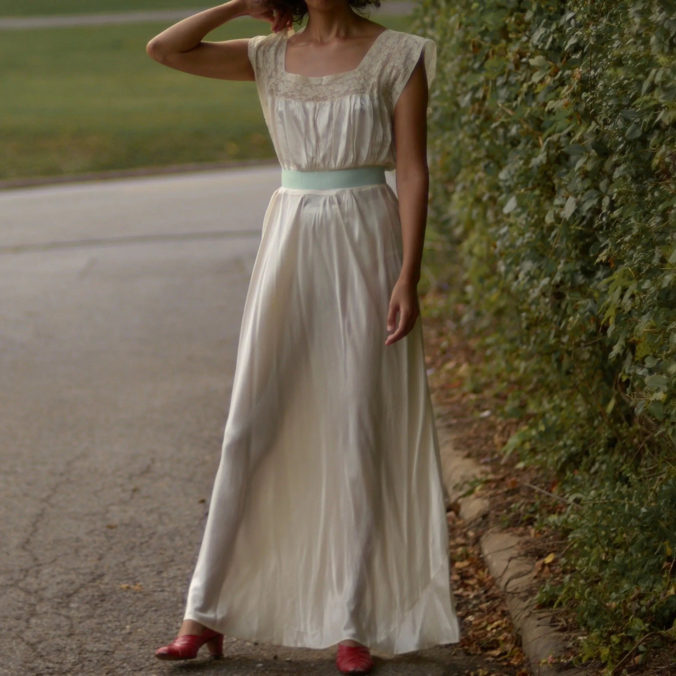 1930s cream satin full length bias cut slip dress with alencon lace trim and deep v back // fits up to large