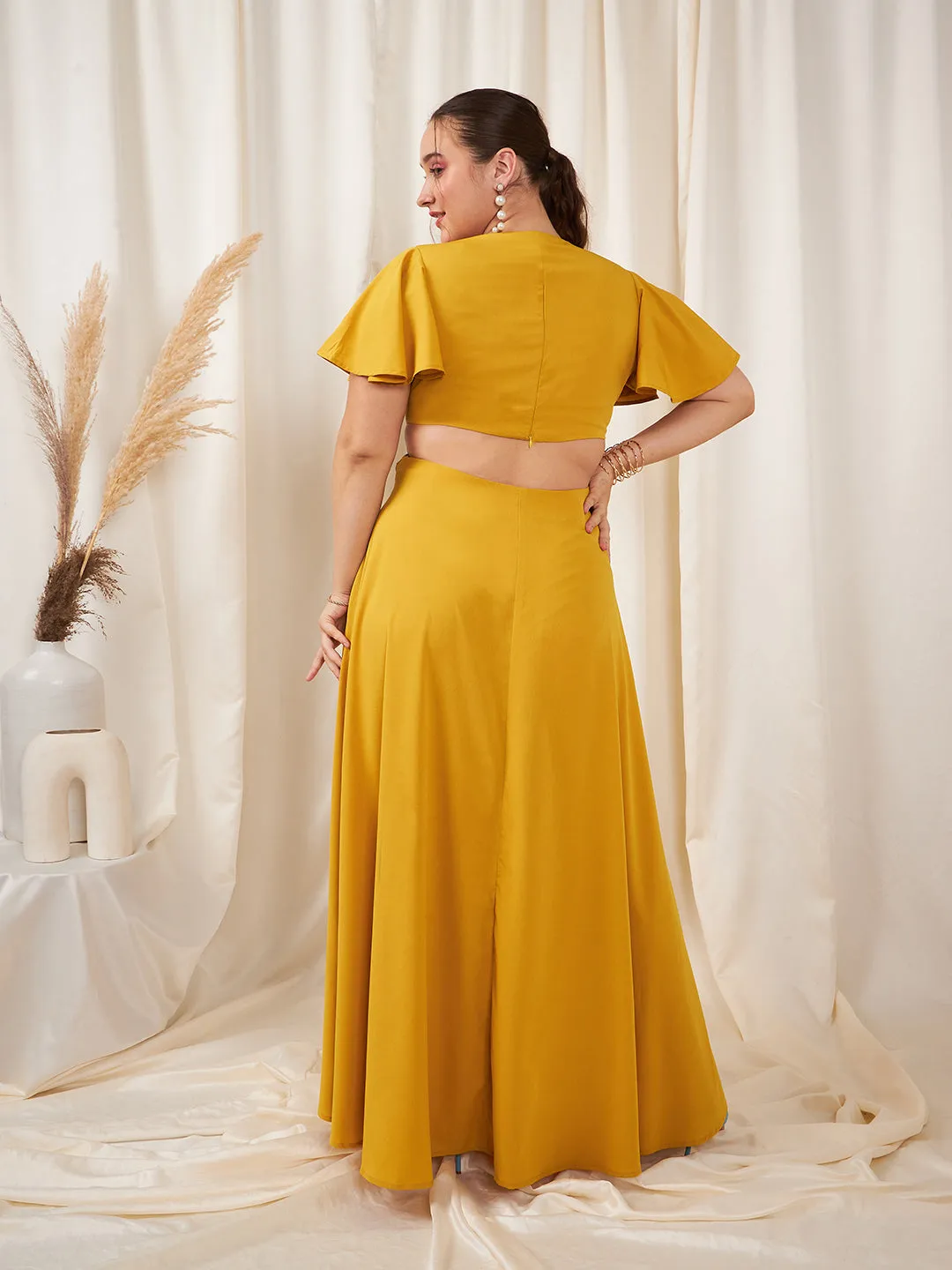 Berrylush Women Plus Size Solid Yellow Round Neck Flutter Sleeve Back Cutout Thigh-High Slit Flared Maxi Dress