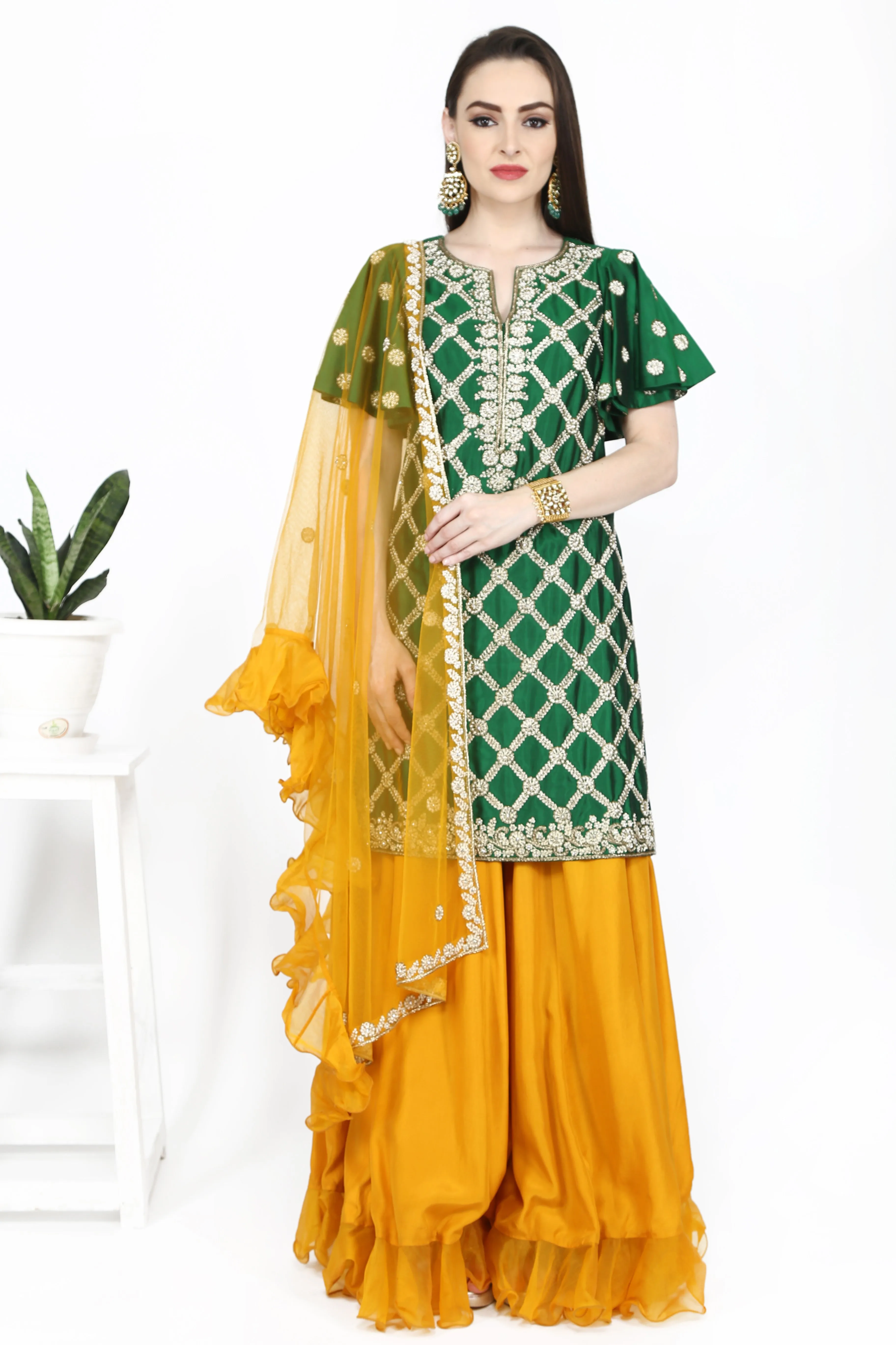 Emerald green tunic and mustard yellow flare sharara.