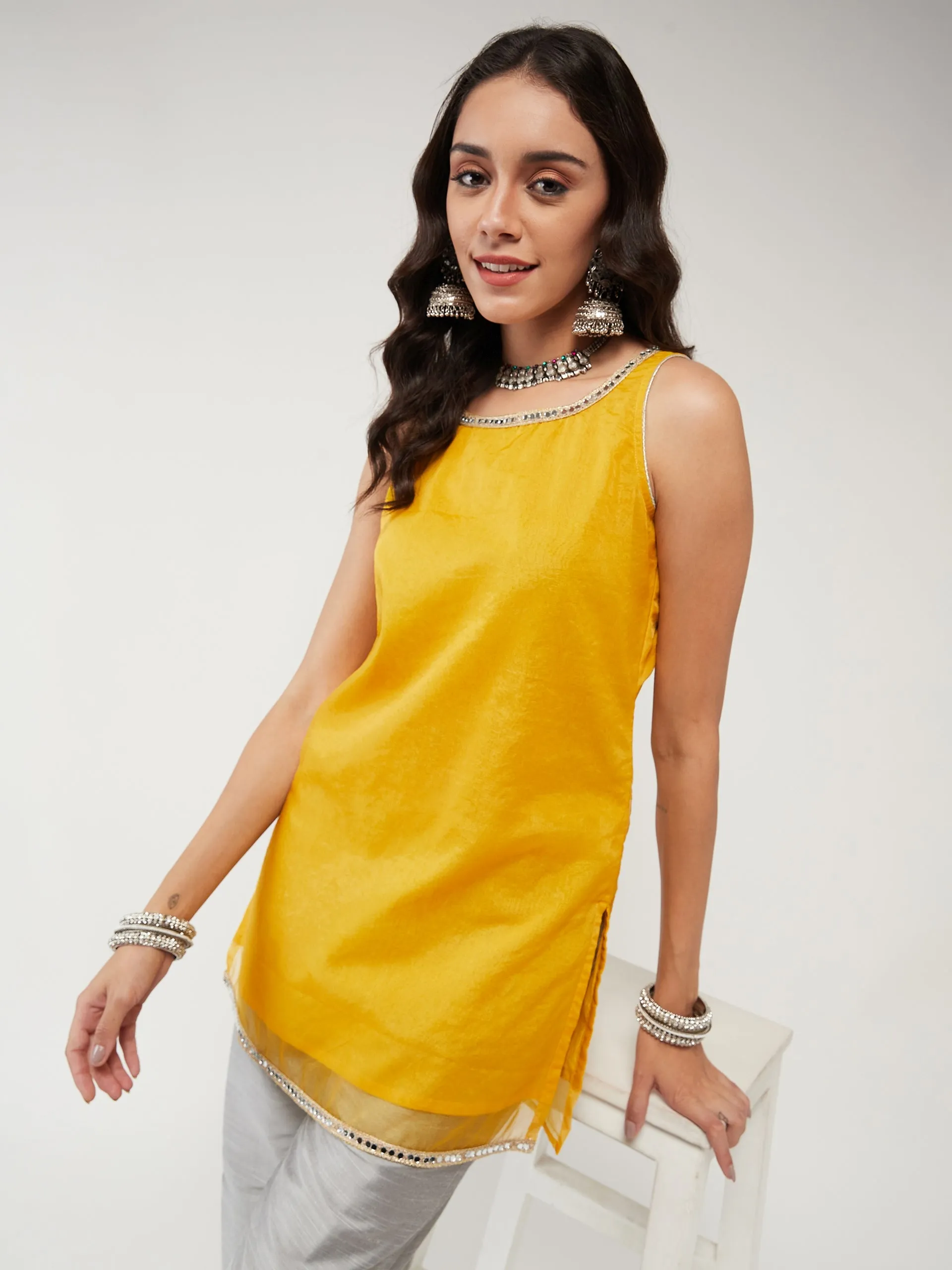 Fusion Short Pastel Sleeveless Kurta With Lace