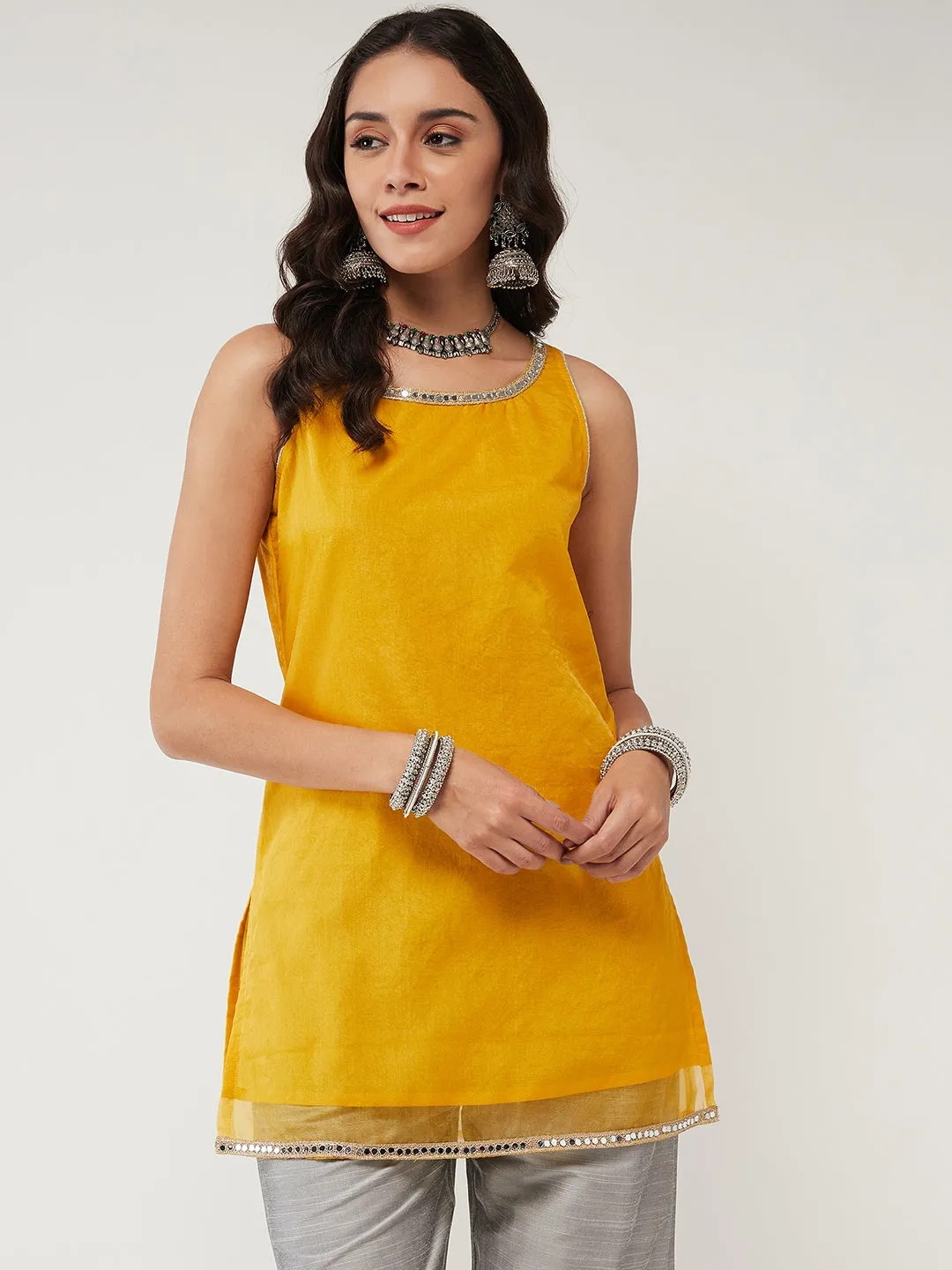 Fusion Short Pastel Sleeveless Kurta With Lace